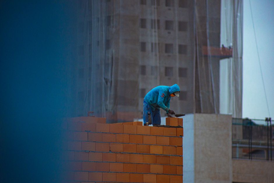 Professional mason bricklayer at work